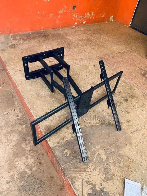 Experience Ultimate Viewing Flexibility: Adjustable TV Mount · Photo 1