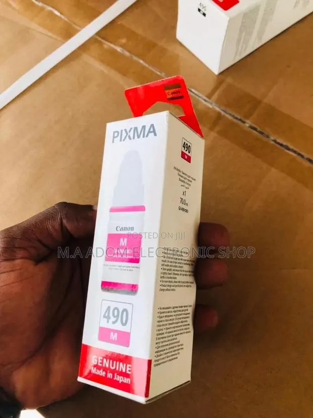Canon GI-590 Red Ink: High-Yield, High-Quality Ink · Photo 1