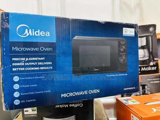 Mesmeric Design Microwave Oven 20l Midea · Photo 1
