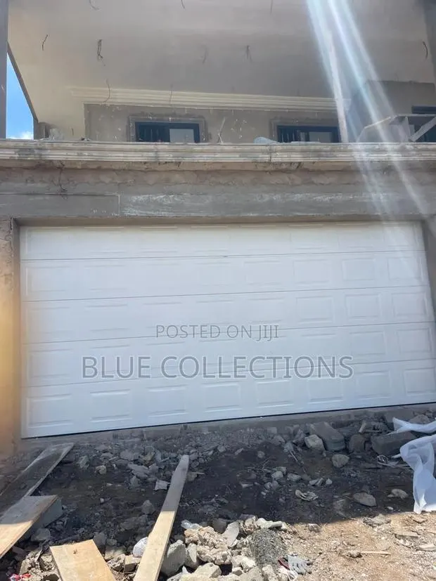 Canadian Garage Door With Automatic Opener · Photo 1