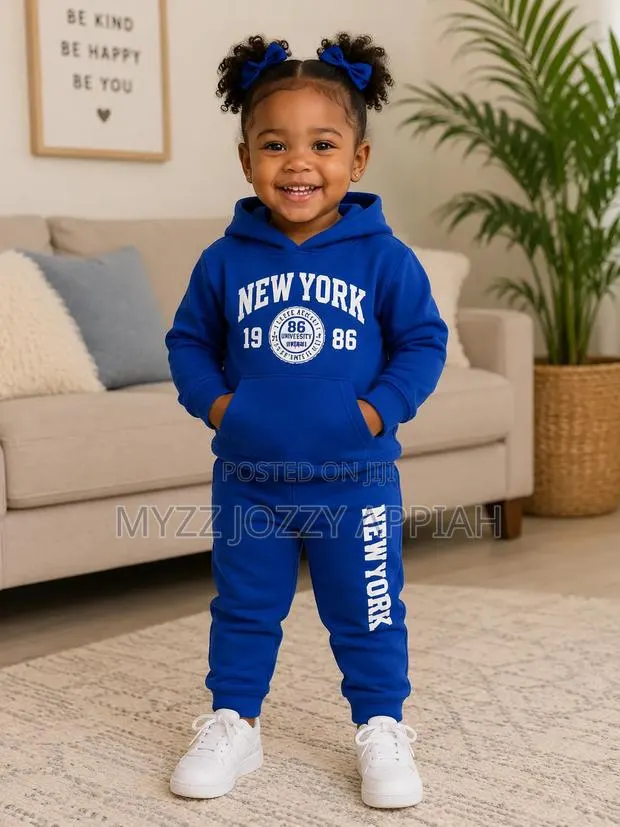 Long Sleeved Hooded Sweatshirt With Matching Jogger Trousers · Photo 1