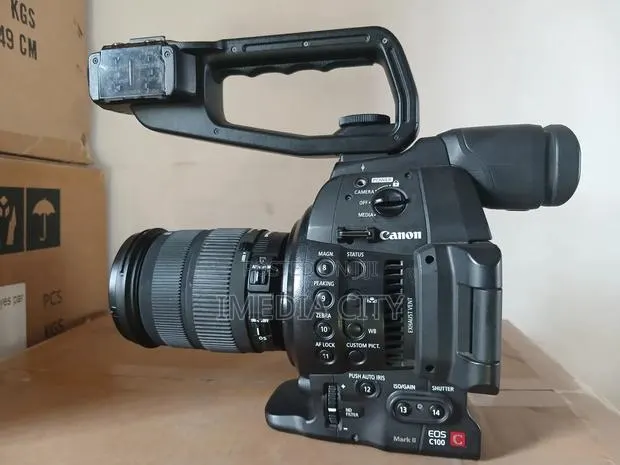 Canon C100 With Lens · Photo 1