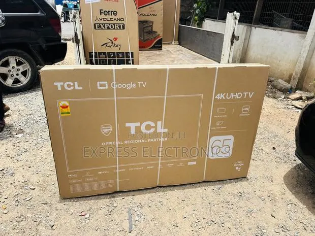 Shop the New TCL 65”UHD Smart · Photo 1