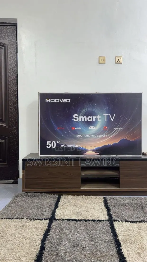 Brand New 50’ TV and Wooden Stand for Sale · Photo 1