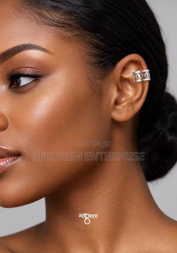 A Pair of Stylish Silver-Tone Adinkra Ear Cuff (Earrings) · Photo 1