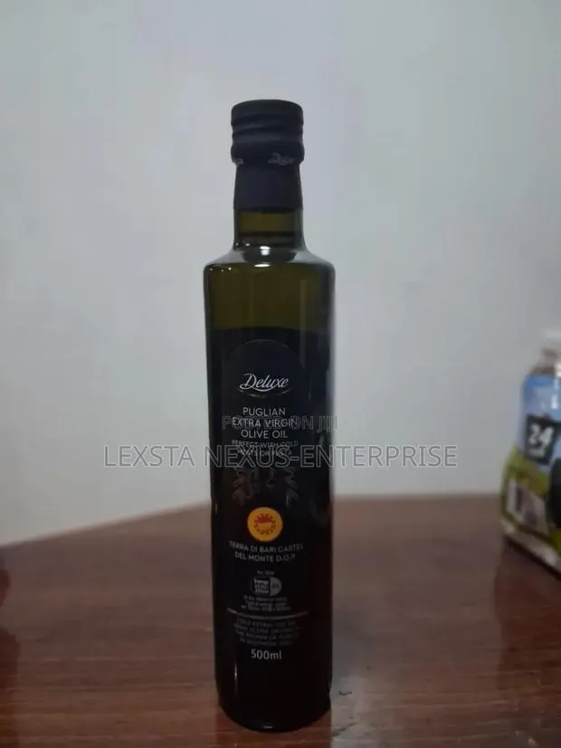 Cold-Pressed Organic Extra Virgin Olive Oil in a Dark Glass Bottle · Photo 1