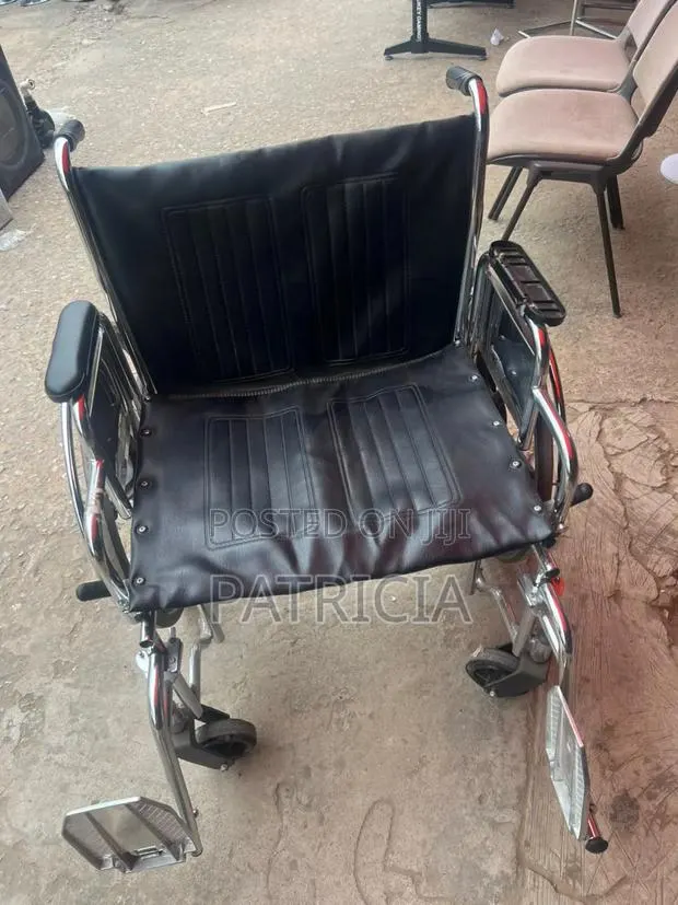Manual Wheelchair – Black Leather Seat Chrome Frame · Photo 1
