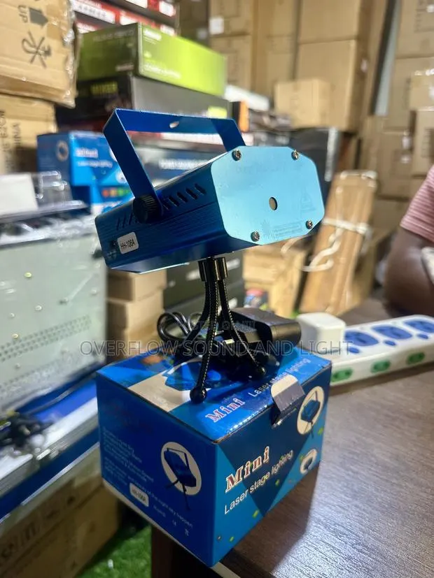 Mini Laser Stage Lighting Projector, · Photo 1