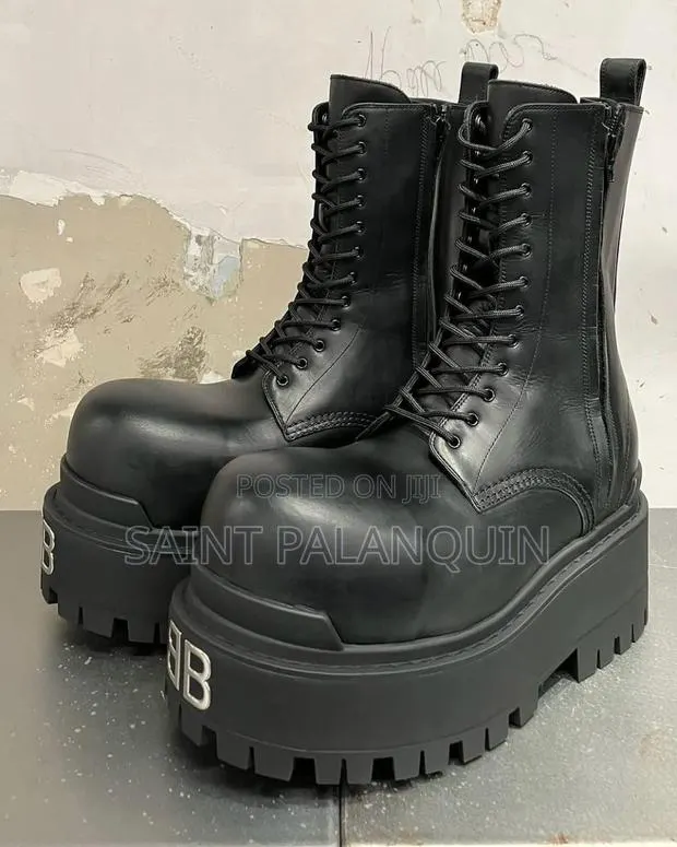 BalenciagaBoots an Exaggerated, Ultra-Round Toe, Tall Lace-Up Shaft · Photo 1