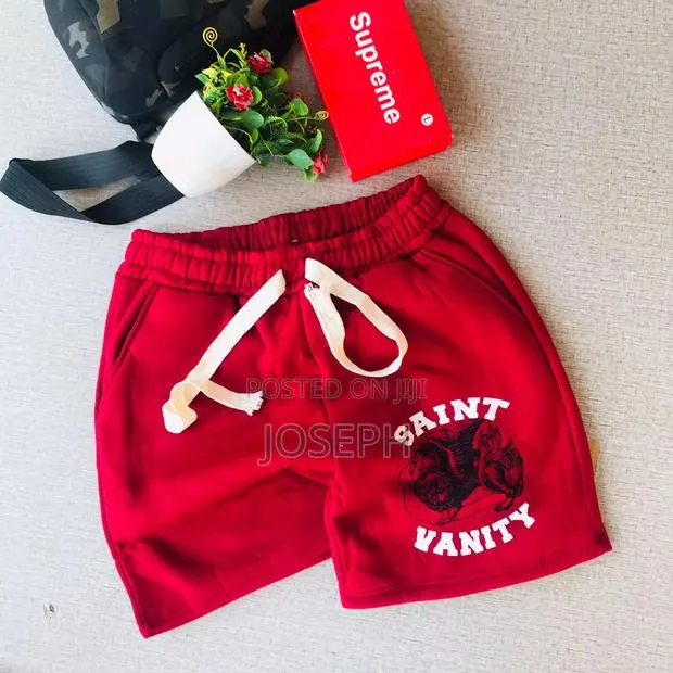 Red Graphic Drawstring Shorts With a Bold Dripping-Style Design · Photo 1