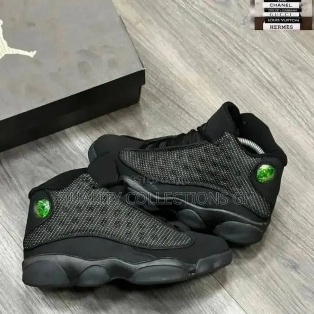Jodan 13 All Black · Photo 1