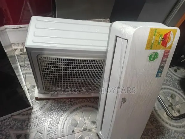1.5hp White Rainbow Turbocool Window Ac- Legendary Cooling. · Photo 1