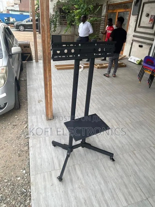 Glamorous Mobility: The Sleek Rolling Trolley Tv Stand for Your Home · Photo 1