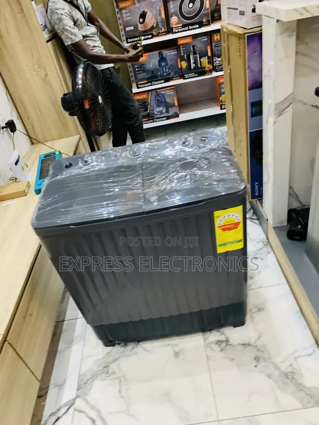 Spectacular Performance 11kg Topload Black Back Topload Twintub · Photo 1