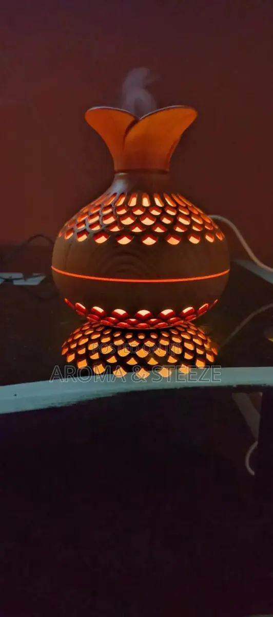Ultrasonic Aroma Humidifier + Essential Oil · Photo 1