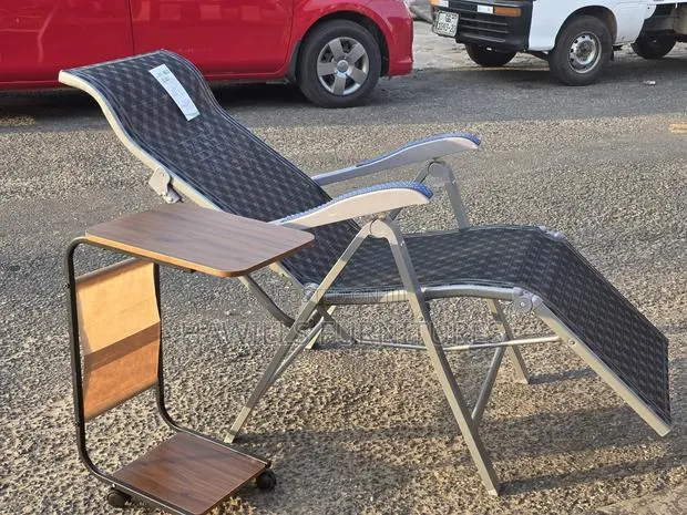 Lounge Chair Featuring a Steel Frame Mesh. · Photo 1