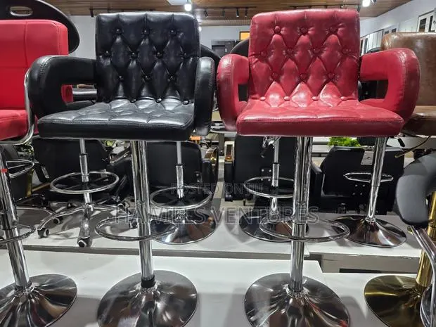 Adjustable Swivel Bar Stool With Tufted Leather. · Photo 1