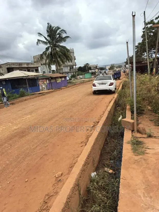 90x100ft Roadside Land for Sale at Pantang Abokobi Highway · Photo 1