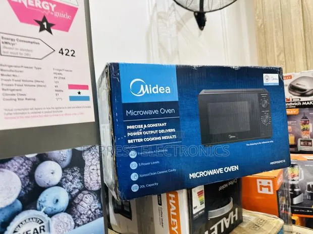 Get a New Microwave Oven 20midea Electric Black · Photo 1