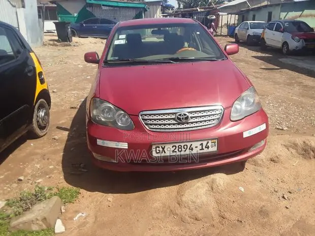 Toyota Corolla 2006 Red · Photo 1
