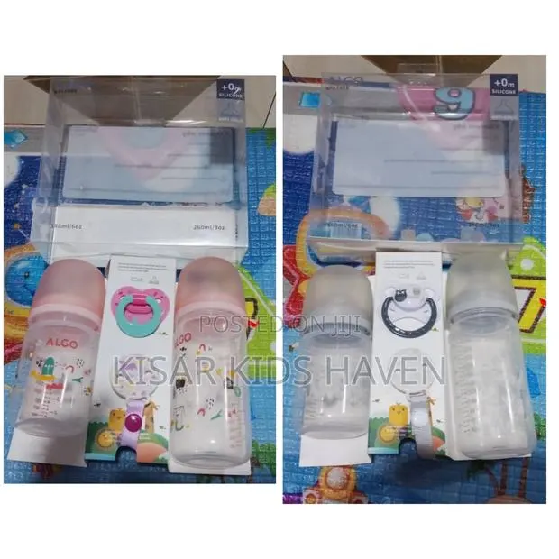 Feeding Bottle Set ( 2 Bottles and 1 Pacifier) · Photo 1