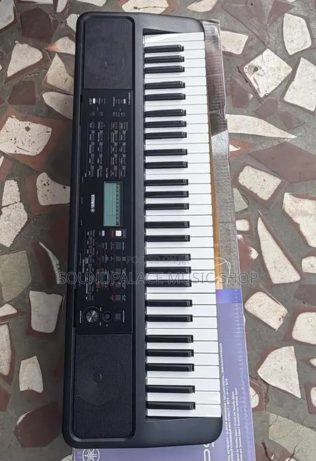 Yamaha PSR-E383 61-Key Portable Keyboard · Photo 1
