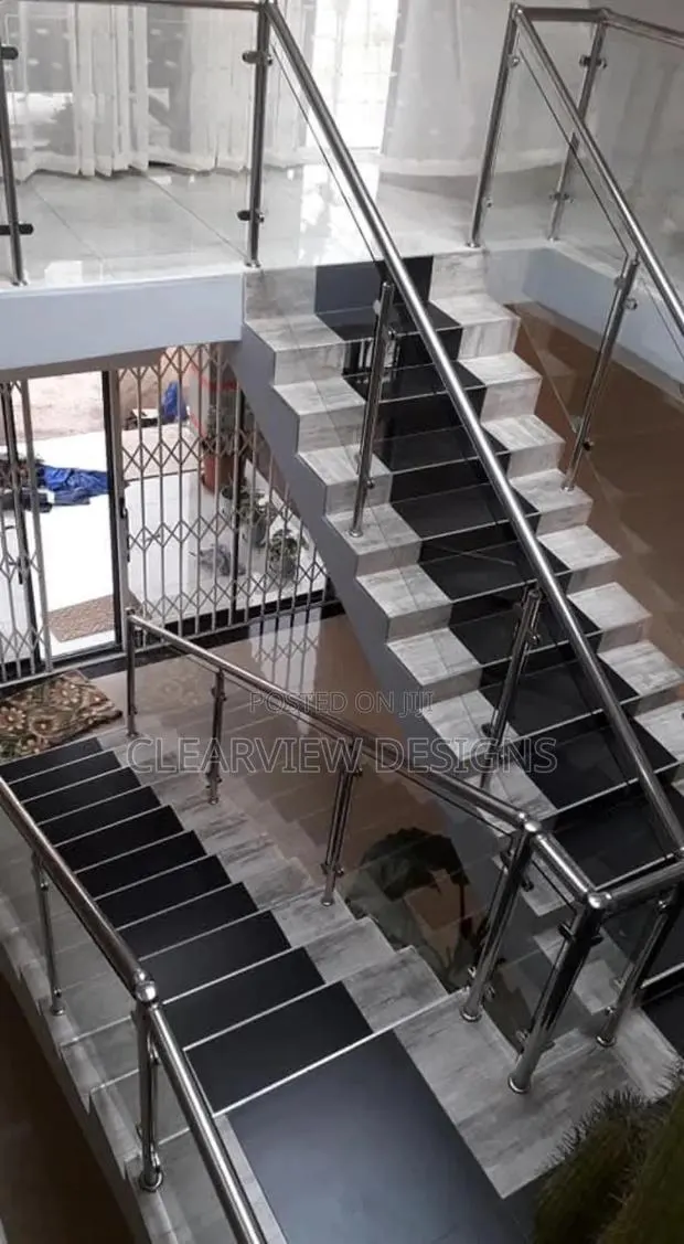 Premium Stainless Steel With Glass Handrail · Photo 1
