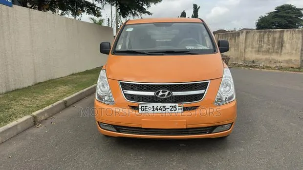Hyundai Starex 2014 Orange · Photo 1
