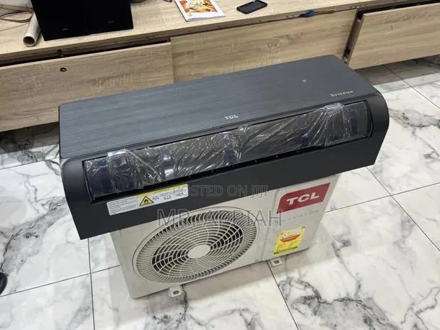 Get Authentic TCL 1.5hp Inverter Dark Gray Wooden Finish(Remote). · Photo 1