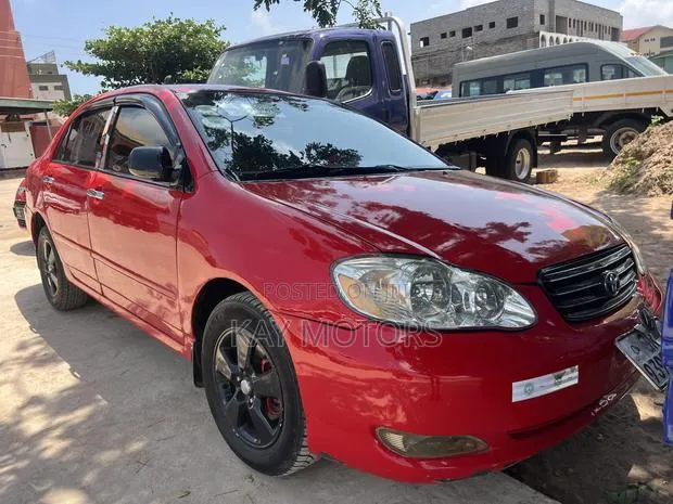 Toyota Corolla LE 2005 Red · Photo 1