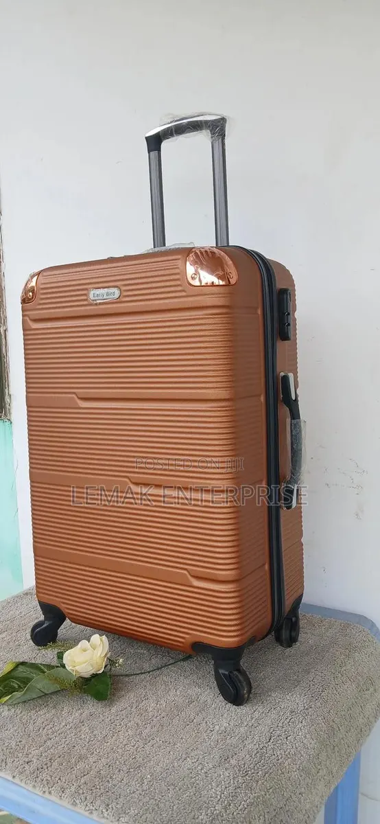 Hardshell Spinner Traveling Suitcase – Copper/Bronze Color. · Photo 1