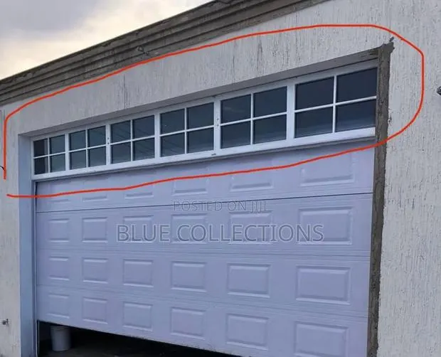 Morden Automated Garage With Fanlight · Photo 1