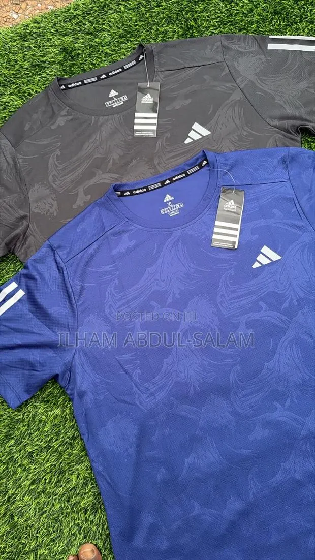 Adidas Tops · Photo 1