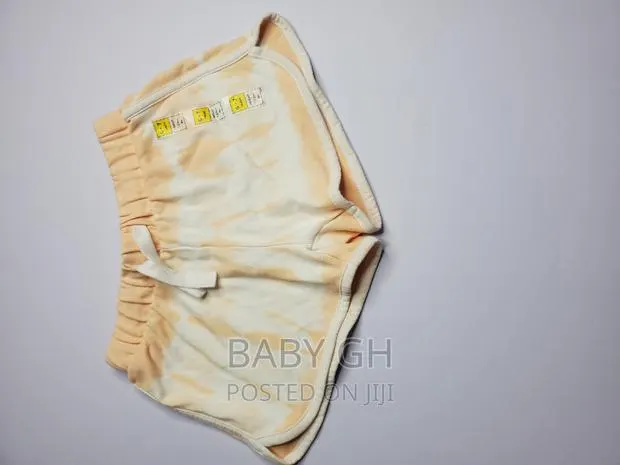 All in Motion Orange and White Water Color Soft Shorts · Photo 1