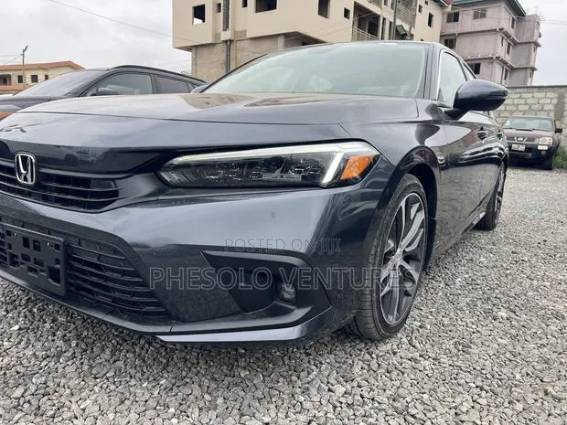 Honda Civic Touring CVT 2024 Gray · Photo 1
