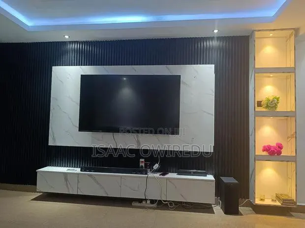 Television Wall Mounted Design With Panels · Photo 1