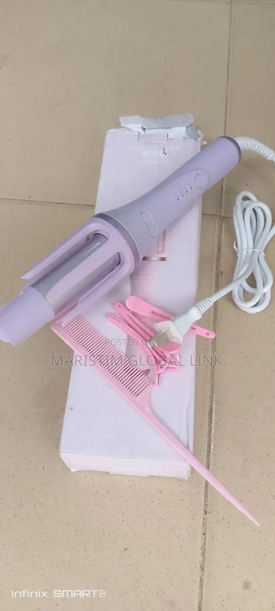 Wired Rotating Hair Curler · Photo 1