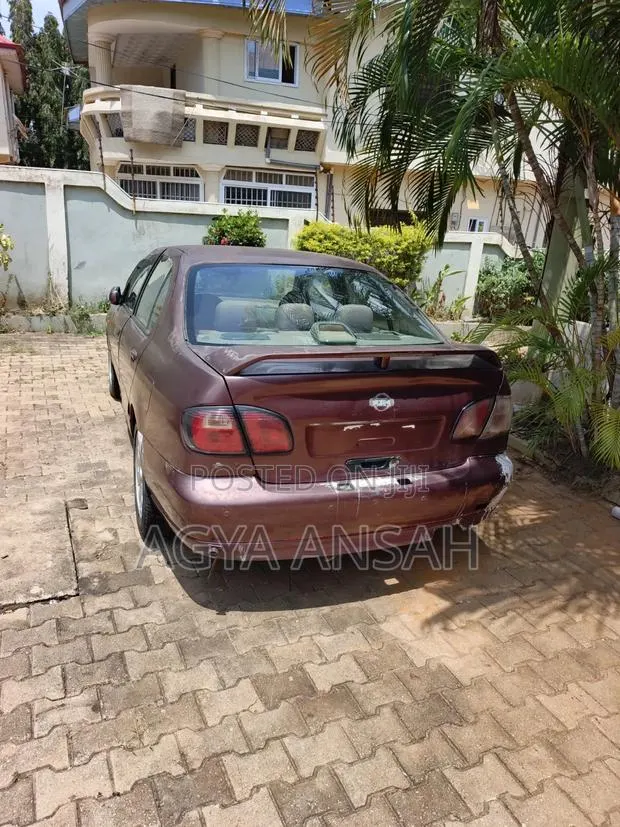 Nissan Primera 2.0 Break 2002 Maroon · Photo 1