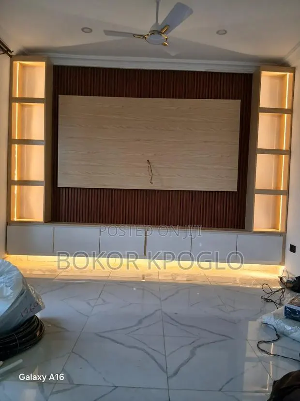 The Master of Laminate Work Interior TV Decor · Photo 1