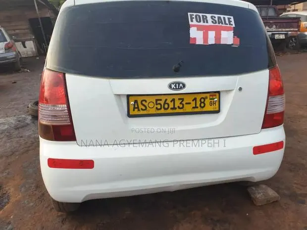Kia Picanto 2010 White · Photo 1