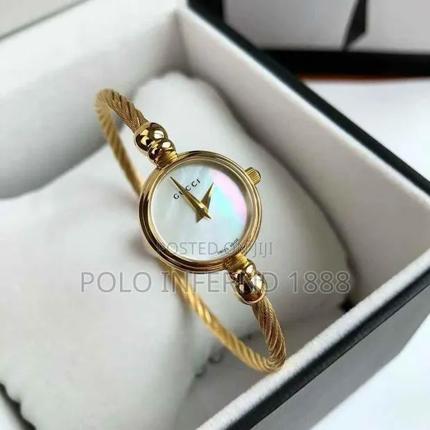 Gucci Gold Watch · Photo 1