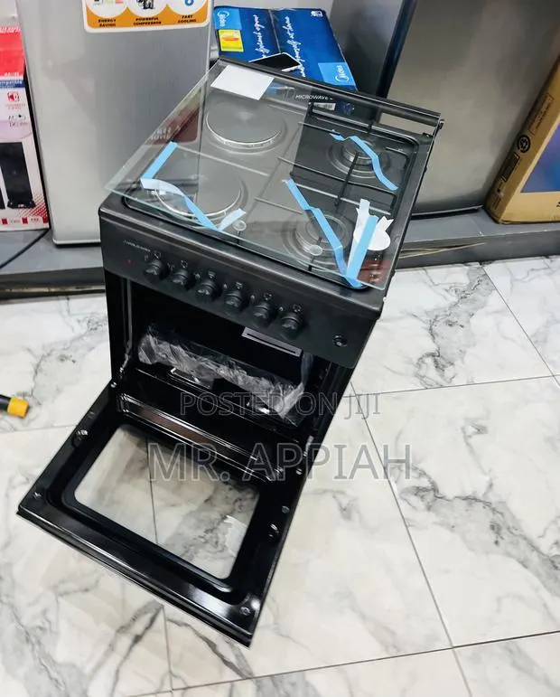 Volcano 50x50 Freestanding 2 Gas With 2 Electric Burner With Oven. · Photo 1
