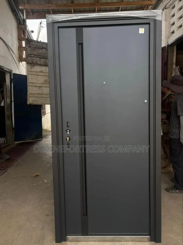 Quality Strong and Dack Gray Smooth Door at Devinefortress · Photo 1