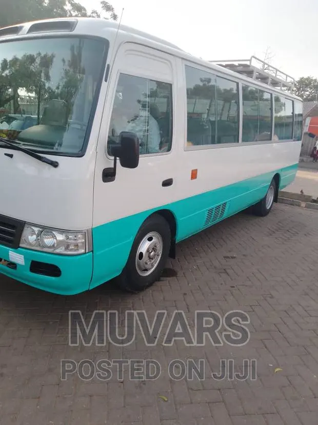 Car Rentals Service. Coaster Bus for Hiring · Photo 1