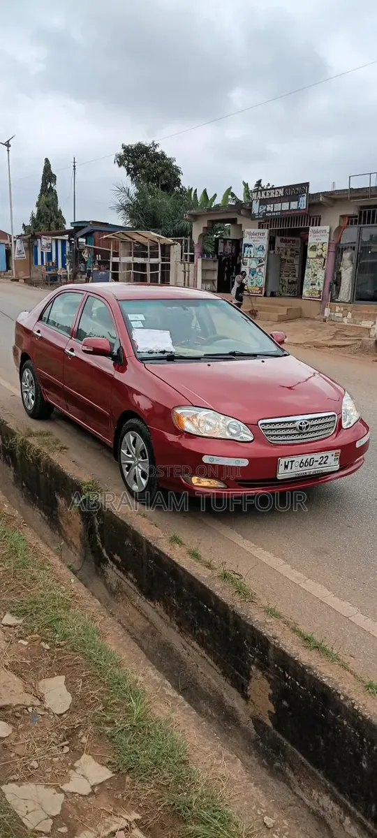 Toyota Corolla 2006 Red · Photo 1