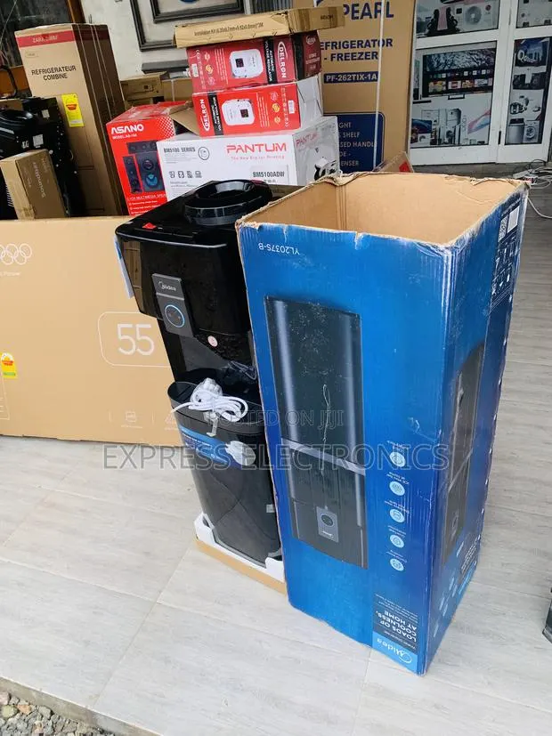 Newly in Box Blank With Fridge Midea Water Dispenser 30L · Photo 1