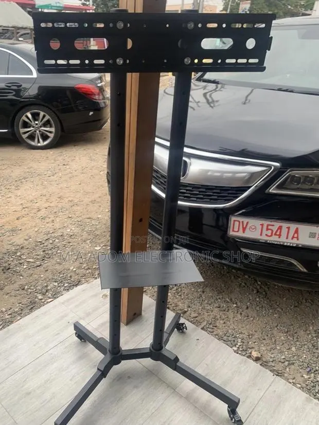 Purchase Adorable Moveable Tv Trolly for 32”-70” Television. · Photo 1