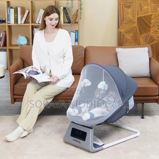 Coolbaby Electric Baby Swing · Photo 1