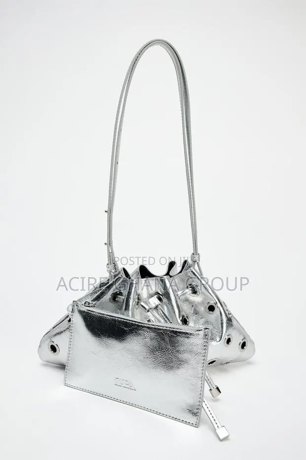 Zara Mini Eyelet Bucket Bag · Photo 1