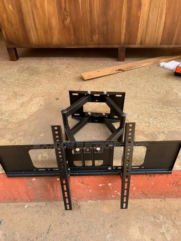 Affordable Adjustable Wall Mount for Tv Between 42” to 80, · Photo 1